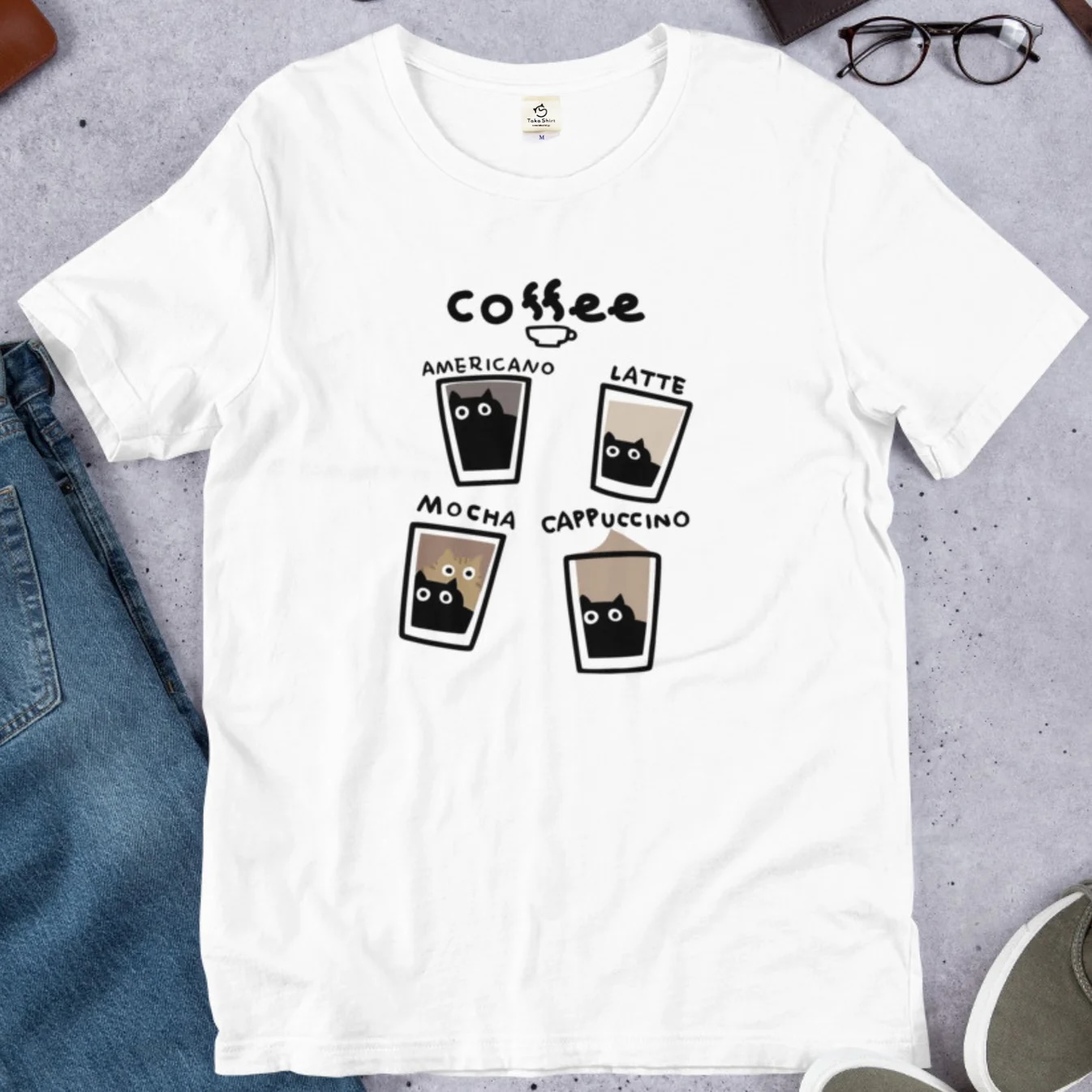 コーヒーのなかに、猫ちゃん発見！<br>ユニークでキュートなTシャツです♪